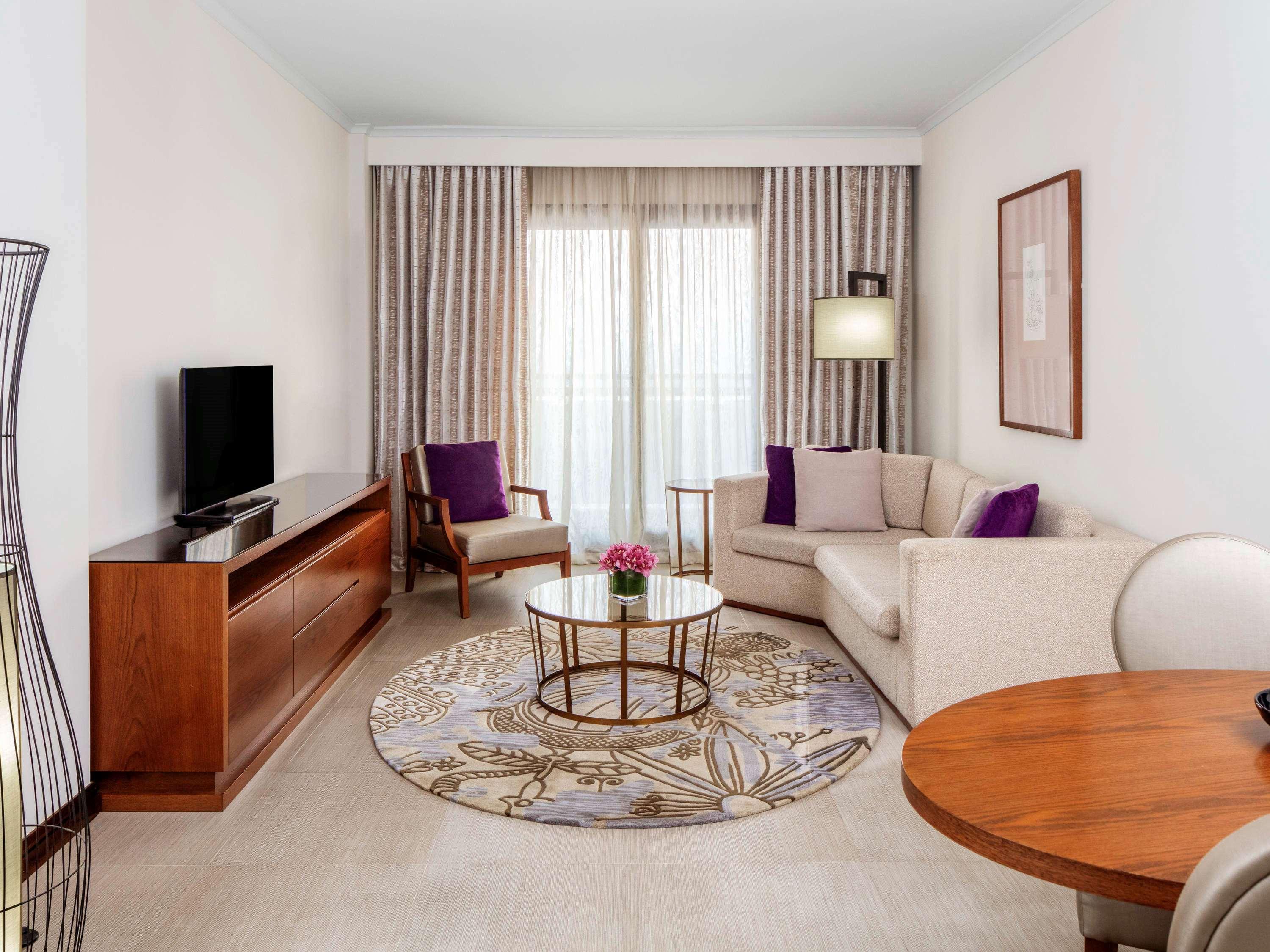 Pullman Dubai Creek City Centre Residences Exterior photo A living room