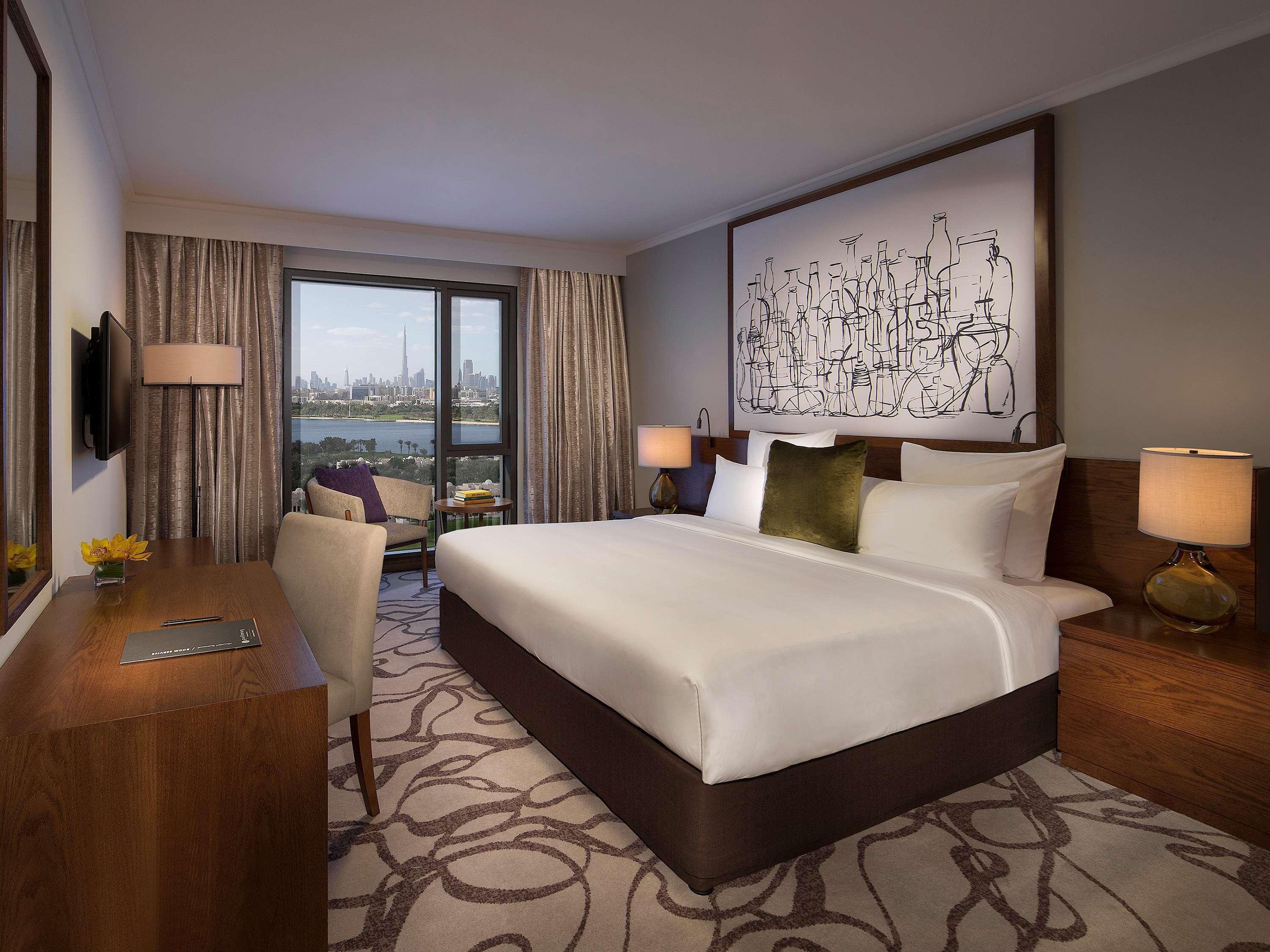 Pullman Dubai Creek City Centre Residences Room photo A bedroom at the hotel