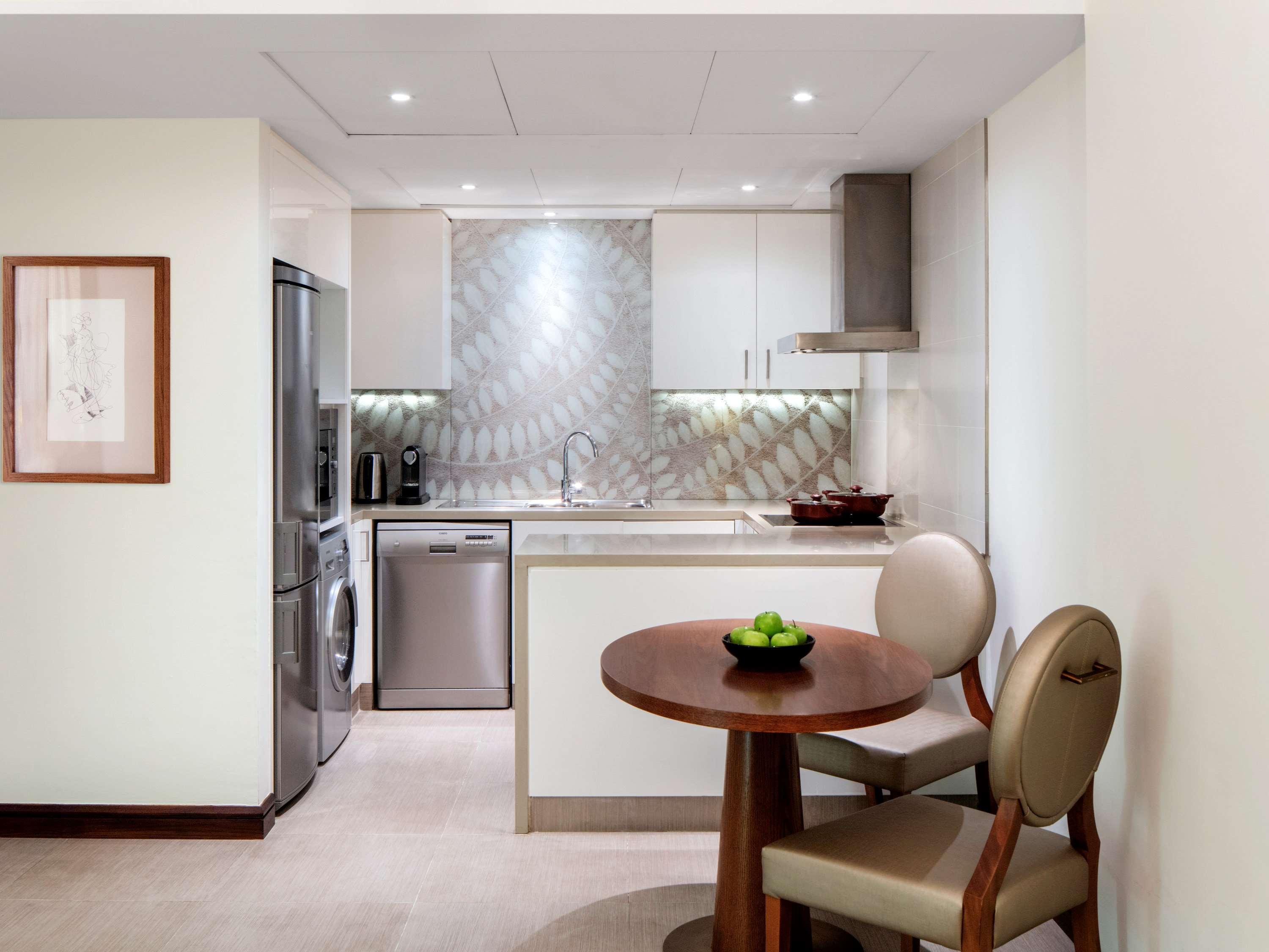 Pullman Dubai Creek City Centre Residences Exterior photo A kitchen in a hotel suite