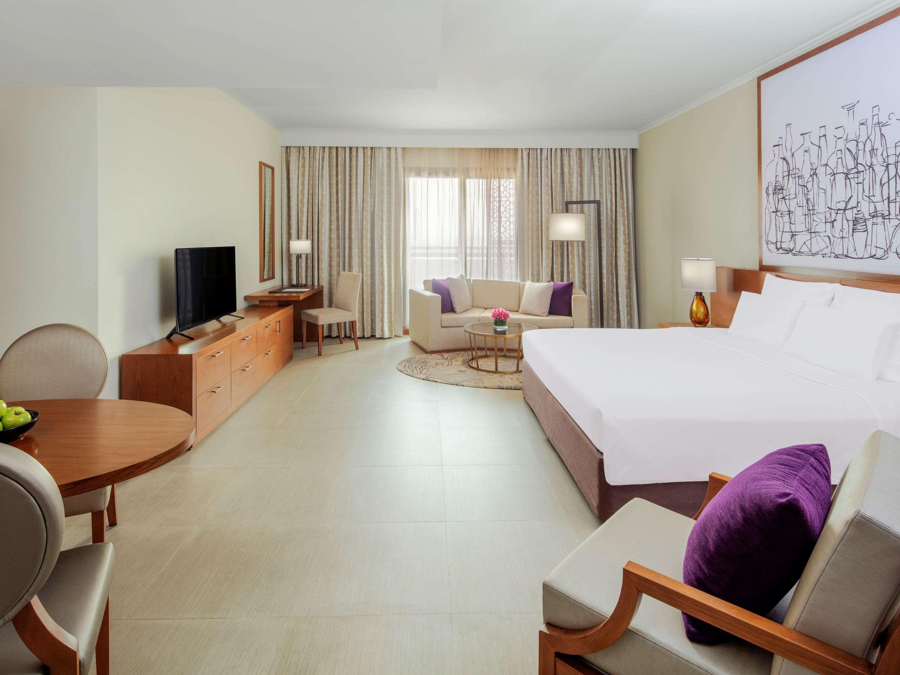 Pullman Dubai Creek City Centre Residences Exterior photo A room at the hotel