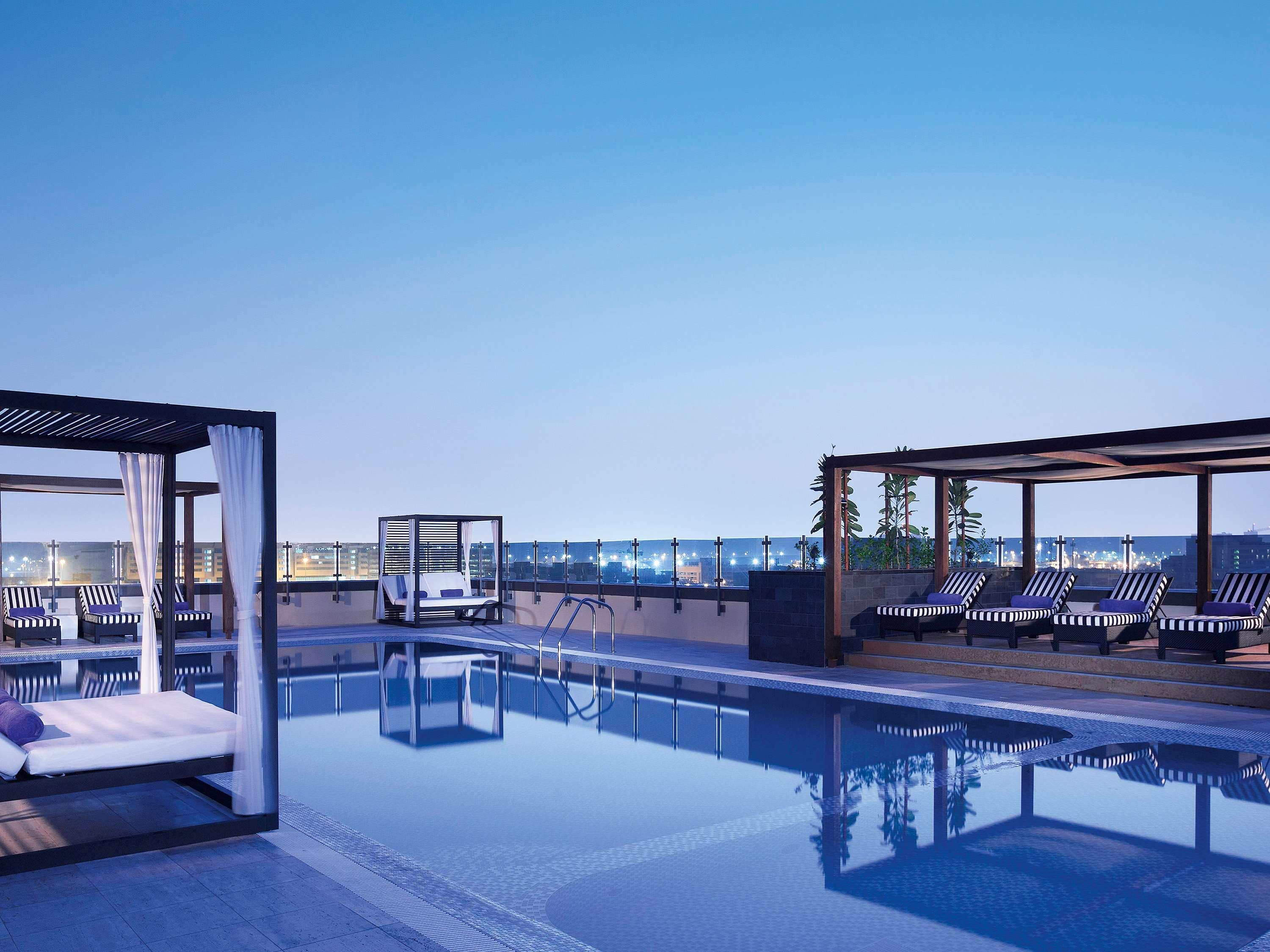 Pullman Dubai Creek City Centre Residences Exterior photo The rooftop pool at the hotel