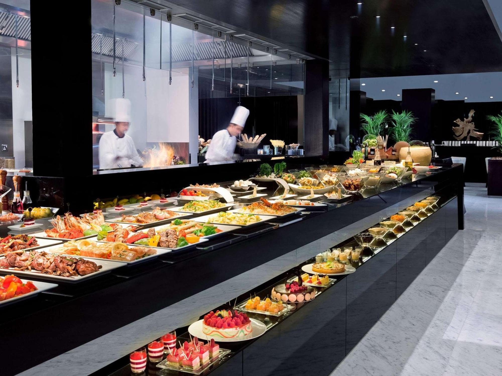 Pullman Dubai Creek City Centre Residences Exterior photo A buffet at a hotel