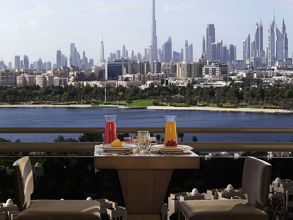 Pullman Dubai Creek City Centre Residences Restaurant photo View of Dubai from the hotel