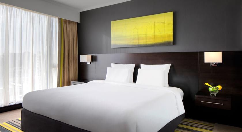 Pullman Dubai Creek City Centre Residences Exterior photo A typical bedroom at the hotel