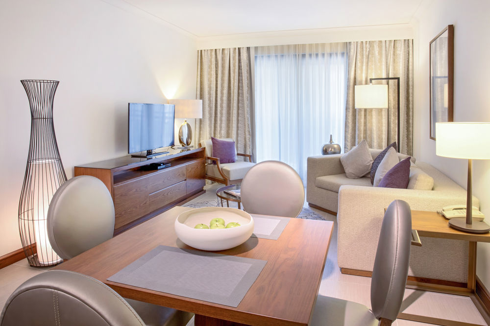 Pullman Dubai Creek City Centre Residences Exterior photo A typical living room in a Residence Inn