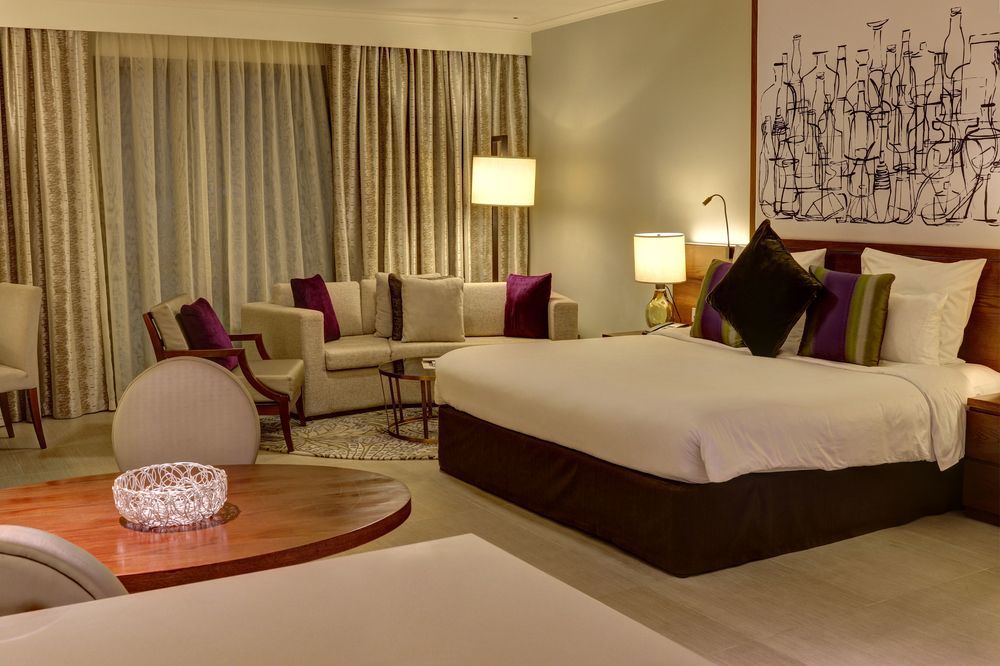 Pullman Dubai Creek City Centre Residences Exterior photo A suite at the hotel